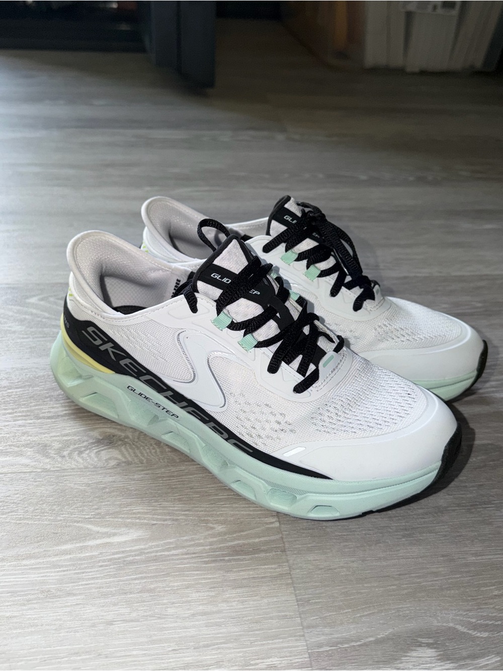 Skechers Women's slip-ins White Mint Athletic Walking Shoes with Black Accents